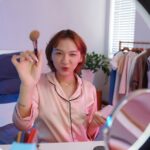 Blogger Applying Translucent Powder